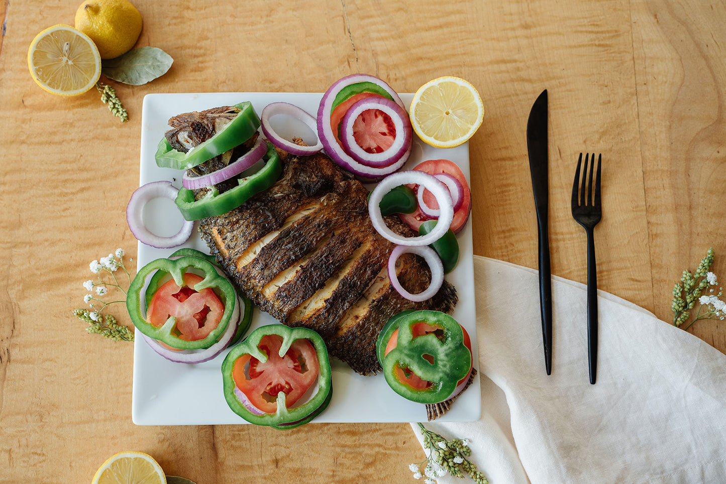 Whole Baked Tilapia with Side of Rice or Fufu